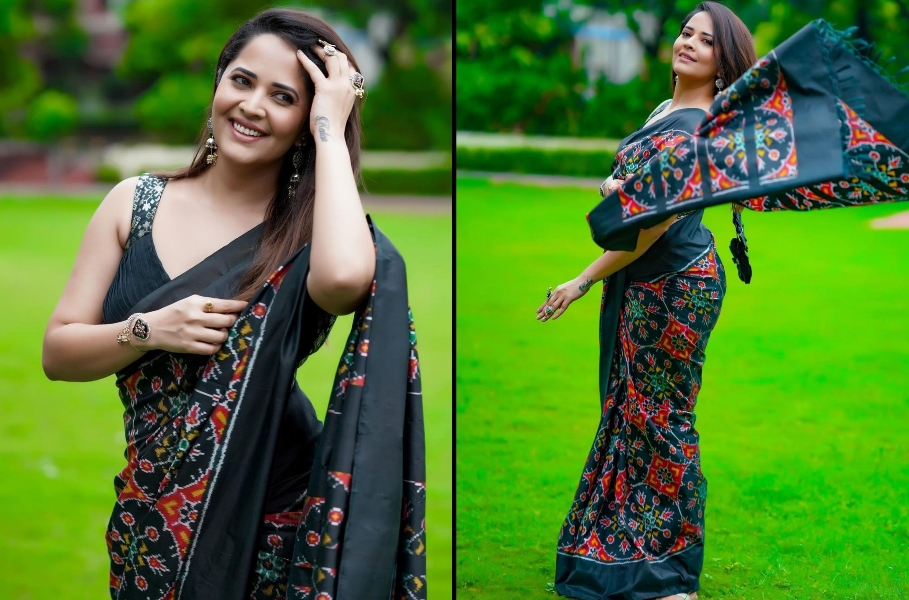  Anasuya Bharadwaj Stuns In Black Saree With Vibrant Ajrakh Prints-TeluguStop.com