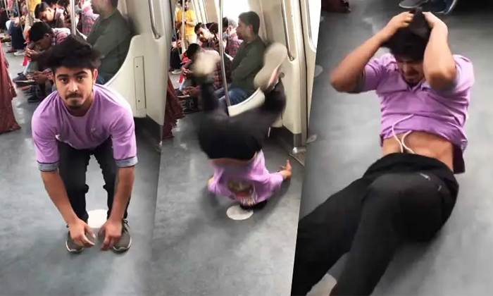  Young Man Back Flip Stunt In Metro Train Gone Wrong Viral Video Details, Young M-TeluguStop.com