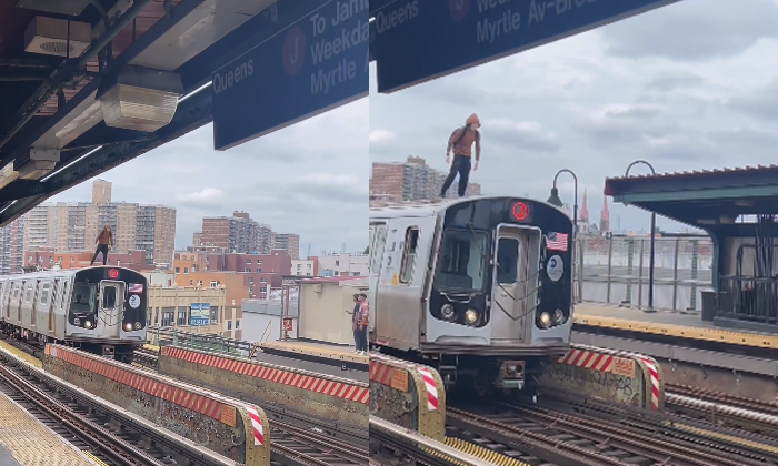 Man stands on top of moving train in New York Viral video detailss