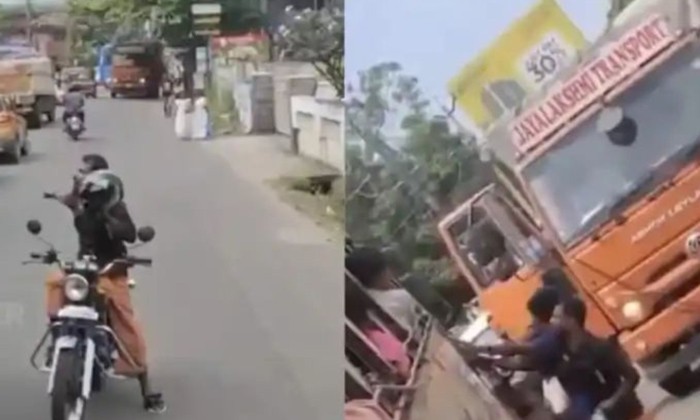  Street Fight Erupts Between Biker And Bus Driver Video Viral,kerala,viral Video,-TeluguStop.com