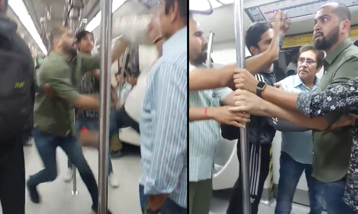  Fight Takes Place Between Passengers Inside Delhi Metro Coach,delhi Metro, Fight-TeluguStop.com