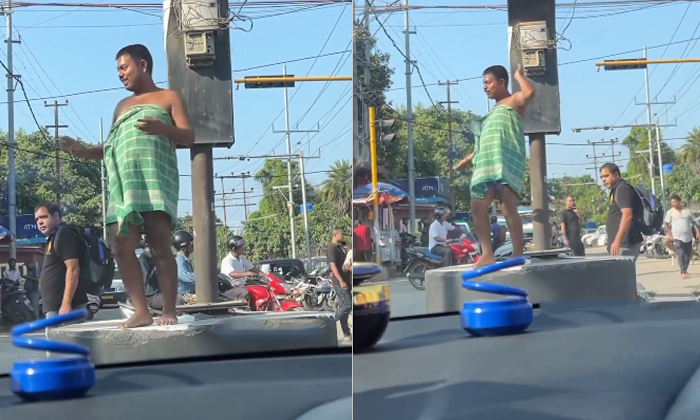  Man Seen Dancing In Towel On Main Road Video Viral Details, Viral Video, Latest-TeluguStop.com