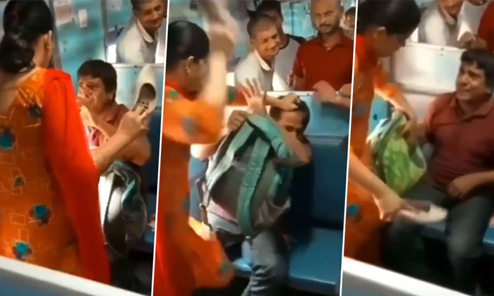  Woman Beats Up Man With Slippers After Being Harassed In Train Details, Woman, S-TeluguStop.com