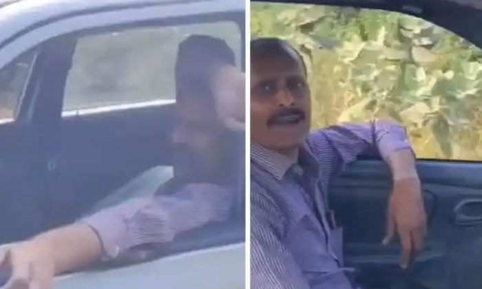  A Man Driving A Car From The Passenger Seat Video Viral , Teslalto, Viral Video-TeluguStop.com