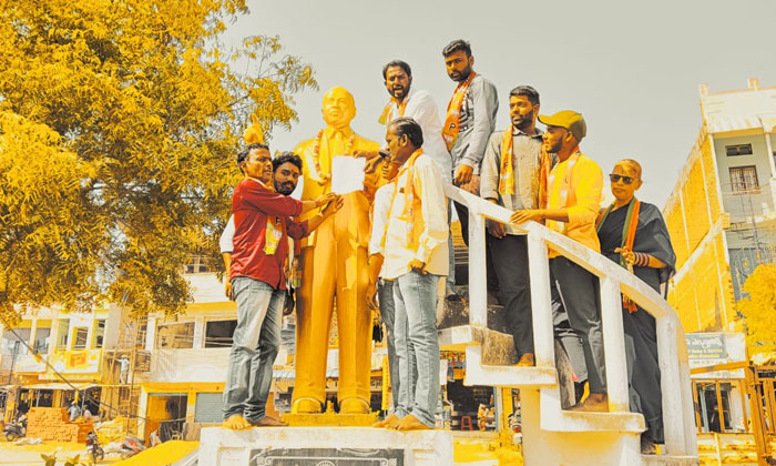  Presenting Petition To Br Ambedkar Statue , Rajanna Sirisilla District , Naga-TeluguStop.com