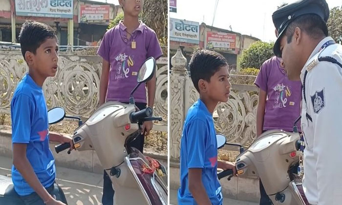  A 13 Year Old Boy Who Was Caught By The Traffic Police Driving A Scooty If You-TeluguStop.com