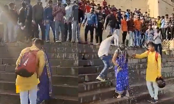  Viral Video Boys Pouring Water On Woman At Manikarnika Ghat Varanasi-TeluguStop.com