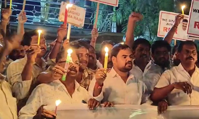  Protest With Candles In Amalapuram To Give Ticket To Raghu Rama Krishna Raju Ama-TeluguStop.com