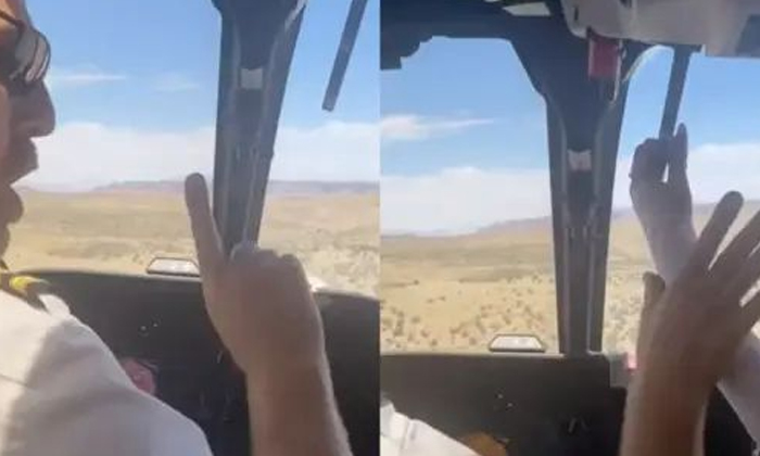  The Young Woman Holding The Helicopter Brake Lever Shocked The Pilot-TeluguStop.com