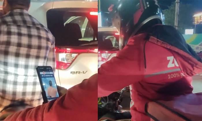  Zomato Delivery Boy Studies For Upsc Exam On Bike While Stuck In Traffic Video-TeluguStop.com