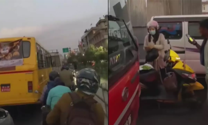  Viral Video Women Started To Cut Vegetables While Stuck In Traffic Jam-TeluguStop.com