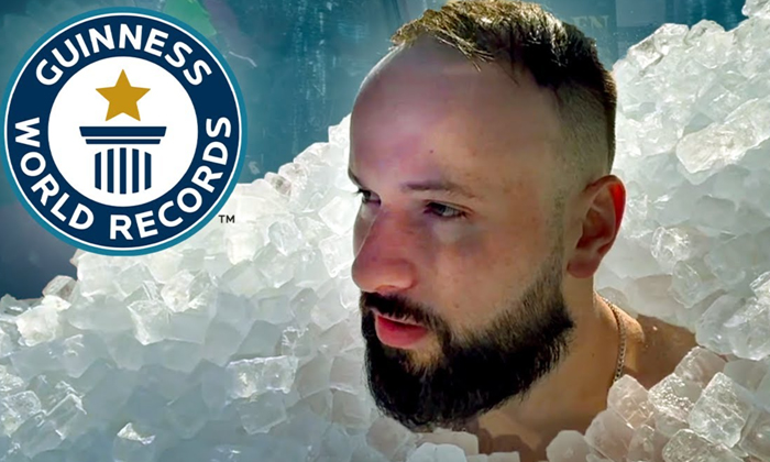  Man Spends Four Hours Submerged In Ice To Smash Record,lukasz Szpunar, 53-year-o-TeluguStop.com