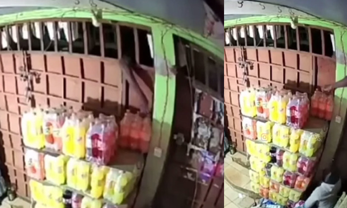  Shop Owner Catches Thief Red Handed Stealing Soft Drinks Viral Video,cool Drinks-TeluguStop.com