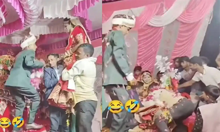  Video Of Groom Leaping From Throne To Put Varmala On Bride Viral Video Details,-TeluguStop.com