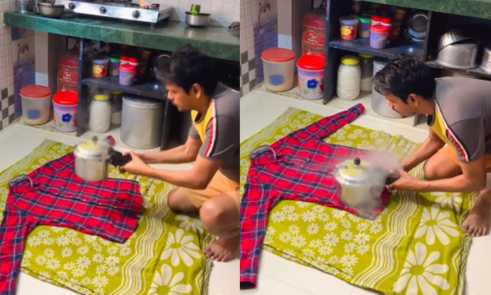  Man Uses Pressure Cooker To Iron His Shirt Video Viral Details, Man, Iron, Shirt-TeluguStop.com