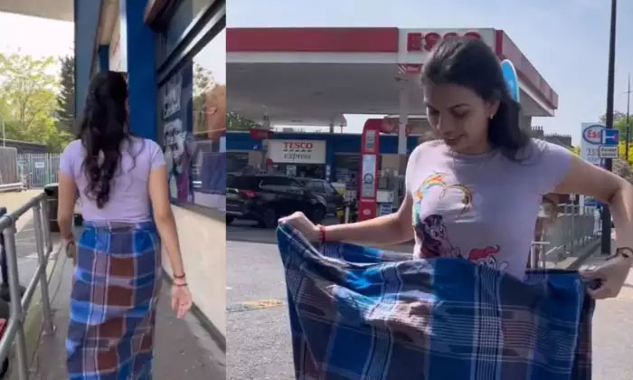  Video: A Young Woman Wearing A Lungi In London.. While Walking On The Streets, S-TeluguStop.com