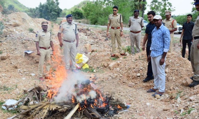  Police Burnt Ganja Under District Drugs Disposal Committee, Police Burnt Ganja ,-TeluguStop.com