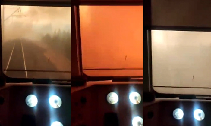  Viral Video Of A Train Passing Through Forest Wildfire In Russia Details, Russia-TeluguStop.com