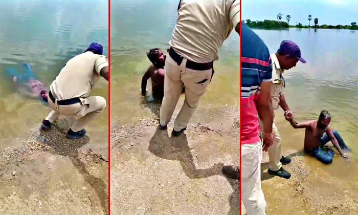  Police Shocked After Trying To Take Out A Man Lying In Water At Hanamkonda Detai-TeluguStop.com