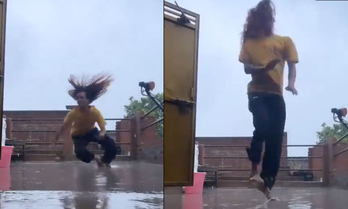  A Man Dance In Rain Viral On Social Media , Viral Video, Social Media, Rain Da-TeluguStop.com