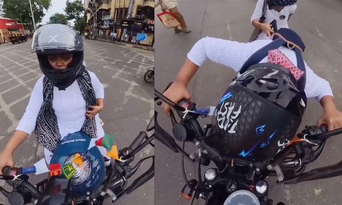  Womans Escape After Scarf Gets Trapped In Bike Handle Viral Video Details, Viral-TeluguStop.com