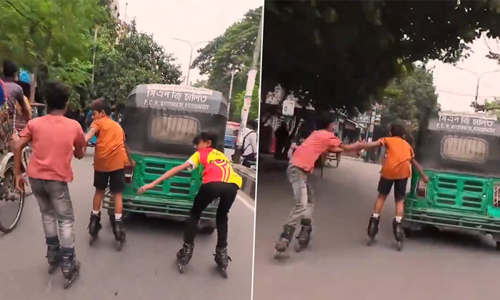  Boys Dangerous Skating Stunts Behind Running Auto Rickshaw Video Viral Details,-TeluguStop.com