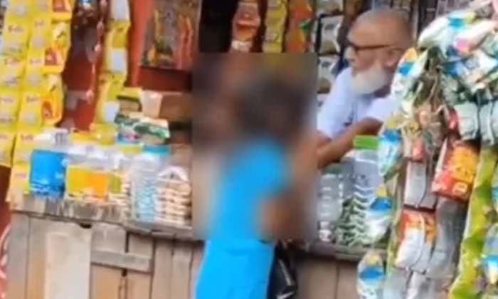  A 70-year-old Man Accompanied A Minor Girl Who Came To The Shop In A Viral Video-TeluguStop.com