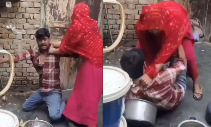  Wife Beat Husband With Kitchen Utensils Funny Video Viral Details, Viral Video,-TeluguStop.com