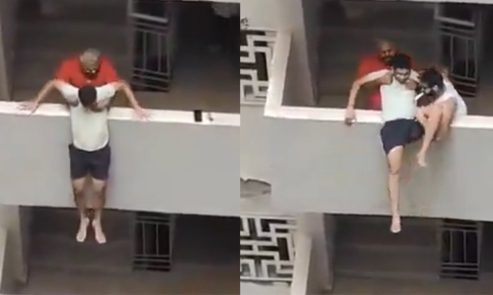  Man Attempts To Jump From 14th Floor Of Noida High Rise Saved By Neighbours Vira-TeluguStop.com