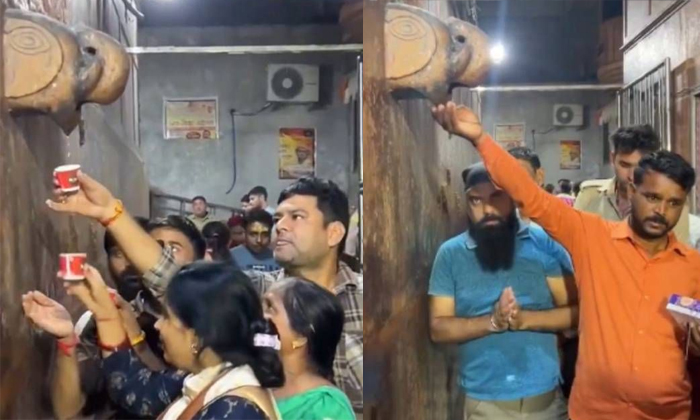  Devotees Drink Dripping Ac Water Believing Its Sacred Water Viral Video Details,-TeluguStop.com