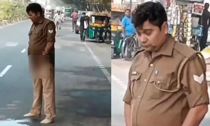  Viral Video Drunk Constable Unzips And Urinates In Middle Of Road Outside Police-TeluguStop.com