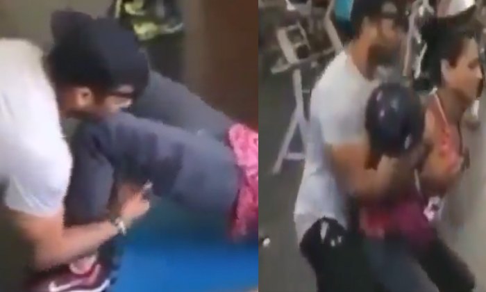  Video: Gym Trainer Inappropriately Touching Woman Under The Guise Of Coaching, G-TeluguStop.com