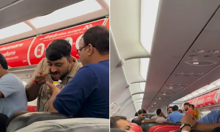  Behaviour Of Indian Passengers On Thailand Flight Irritates Man Video Viral Deta-TeluguStop.com