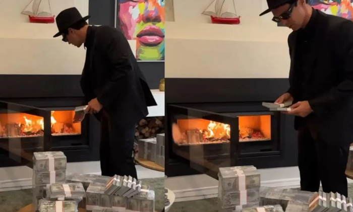  Video Viral Us Influencer Faces Backlash For Throwing Bundles Of Cash In Fire De-TeluguStop.com