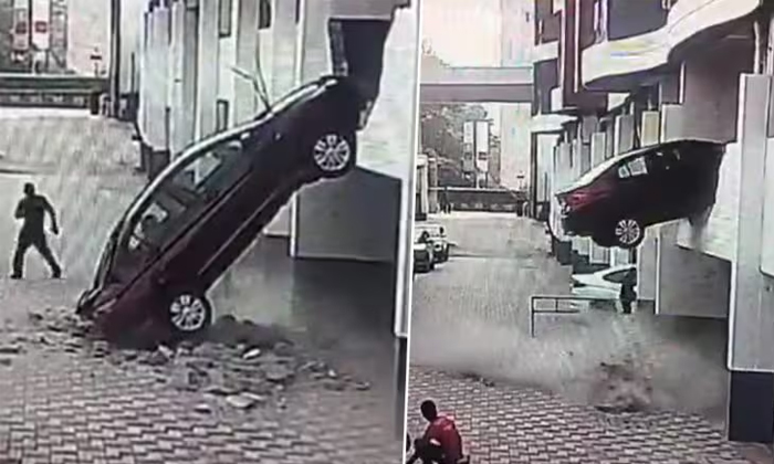  Reverse Parking Gone Wrong Car Falls From First-floor Parking Lot In Pune Video-TeluguStop.com