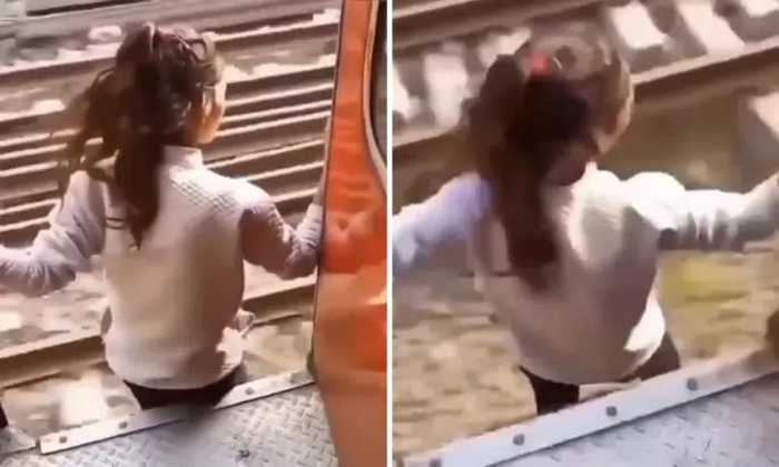 Girl Jumps Off Train In Lucknow Watch The Viral Video Details, Girl Jumps Train,-TeluguStop.com